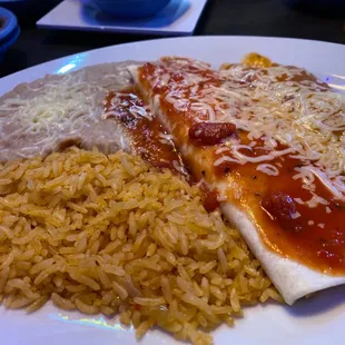 a plate of mexican food with rice and beans