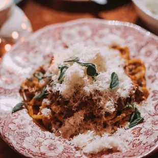 Saffron Spaghetti Bolognese - pork, veal, rosemary, fennel, parmigiano reggiano