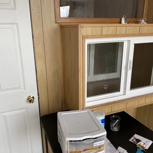 Enclosed and separate from the normal eating area and pick up.