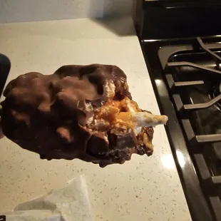 Marshmallow crispy dipped in chocolate (not good or fresh)