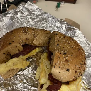 A nice everything bagel with bacon egg n cheese.