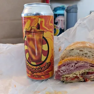 Ham and cheese on Italian bread with beer