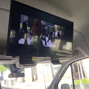 Tv screen on van.