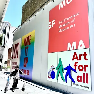 SFSOMA wall poster leading to acrylic enamel wall works by Susan O'Malley, before her death in 2015,