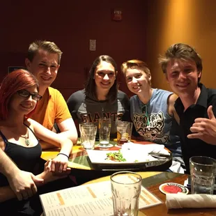 Enjoying craft beer and flat bread pizza on the Baseball - Business - Breweries tour.