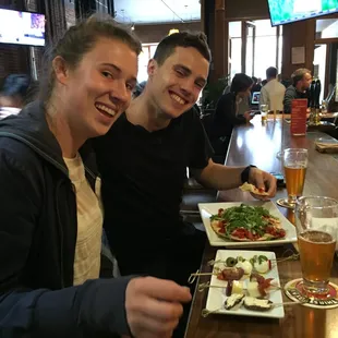 Enjoying tapas and flat-bread pizza at a local micro brewery.