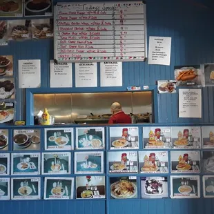 a woman standing in front of the counter