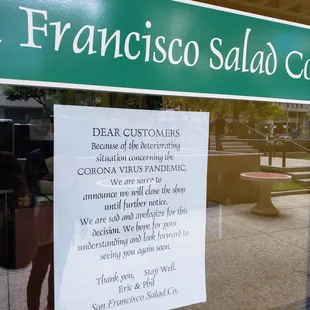 a sign in the window of a restaurant