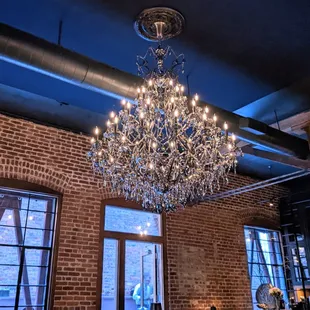 a chandelier hanging from the ceiling