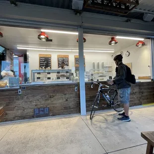 a man standing in front of the counter