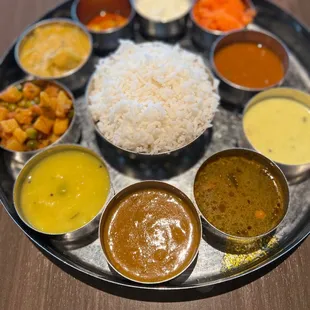 a plate of different sauces and condiments