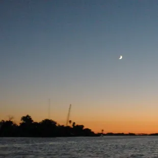 see the sliver of moon on the upper right?