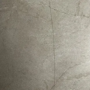 Crack across tile that was replaced by SJVH warranty dept