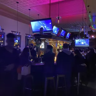 people sitting at the bar