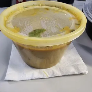 Soup given with bread. I gave it to a co-worker since I don't do cilantro.