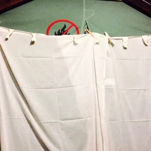 Friend brought curtains to cover up opening in door