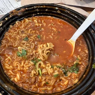 This is supposed to be a French onion beef noodle soup. More like water down shin ramen that cost $18