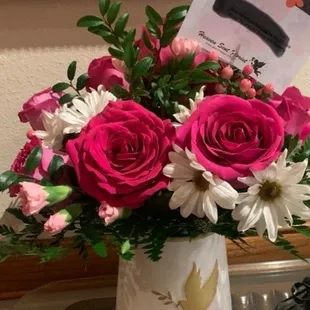 They set up the table where everyone signed in beautifully with the flowers that arrived that morning.