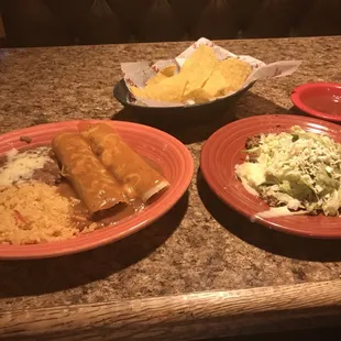 2 enchiladas with beans &amp; rice with side of the Tastaguac