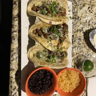 Tacos de Carne Asada, black beans and rice