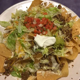 Tonight we tried the Nachos. There pretty good. They would've been better with some chopped onion and jalapeño. My husband and I shared them