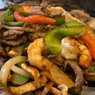 Texas fajitas so delicious! Very fresh shrimp, crispy fresh vegetables served on a sizzling platter! Yummy