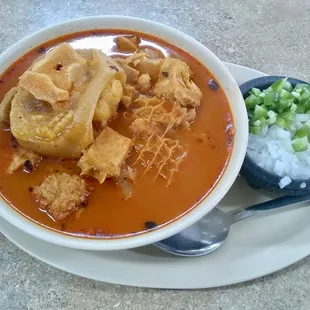 a bowl of soup and a spoon