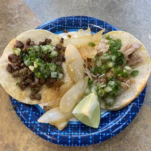 Carne asada and Carnita tacos