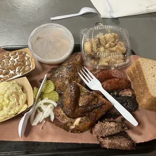 All this plus the drinks you can't see only cost $36 w/tax b4 tip! 1/2 chicken, sausage, .25lb brisket, 2 sides 2 desserts 2 sodas 27APR24