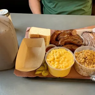Family meal no. 1 - brisket, links, 2 sides and a gallon of sweet tea.