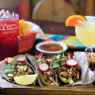 Enjoy this beautiful weather with some Jamaica agua fresca or a refresher Margarita with a delicious al Pastor Tacos.