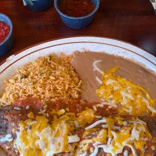 Shredded beef chili Relleno, refried beans and Mexican rice