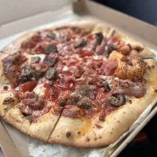 Large meat lovers pizza