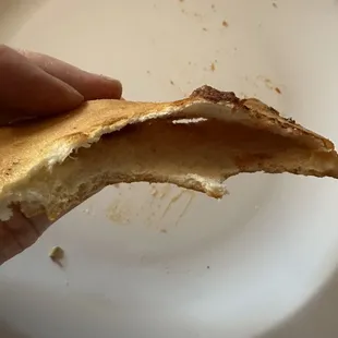 Crust from Large meat lovers pizza