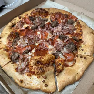 Large meat lovers pizza