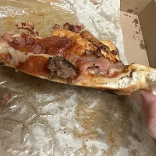 Large meat lovers pizza