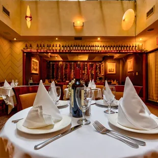 a dining room with tables and chairs