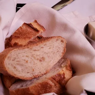 Warm fresh soft sourdough bread.  Resist to save some room.