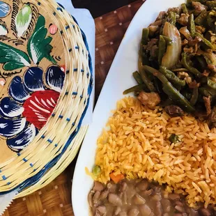 Beef fajitas with cactus and pretty basket filed with four tortillas