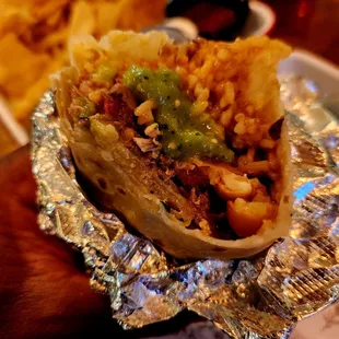 Yummy burrito with their green salsa