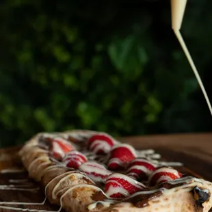 Come try our sweet pizzas! chocolate and strawberry