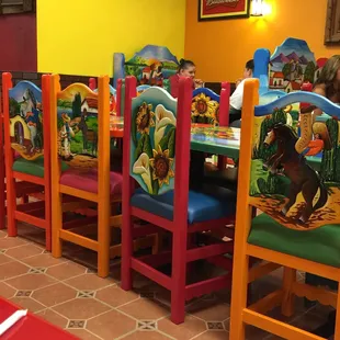 Even the chairs are all painted and carved