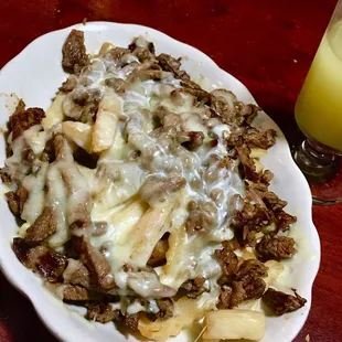 Steak and queso fries 8.99