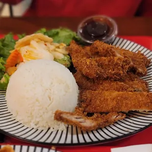 Phenomenal Asian Fusion food stall in the San Pedro Square Market.   Chicken Katsu is one of the best! Just under $20 is a bit high though.