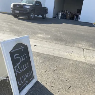 a sign on the side of the road