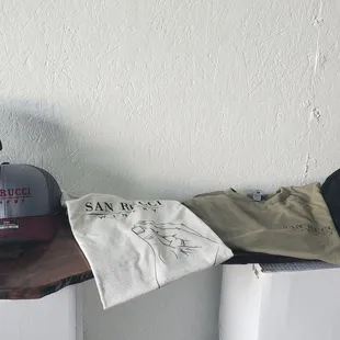 Caps and t-shirts for sale