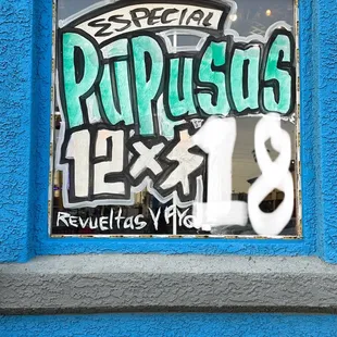 a window with graffiti on it