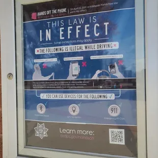 The following is i)egal while driving  12-01-2022