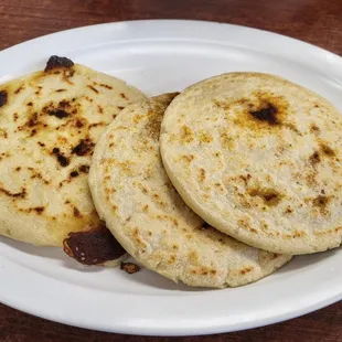 All pupusas look the same on the outside. Freshly made! 10/8/2023