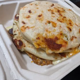 Stack of a variety of pupusas